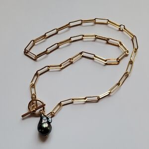 Gold and Black Necklace with Elongated Links and Toggle Clasp